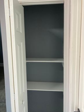 Philadelphia apartment for rent - A white door with a shelving unit inside.