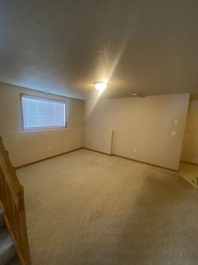 Moorhead apartment for rent - A room with a window and a light on the ceiling.