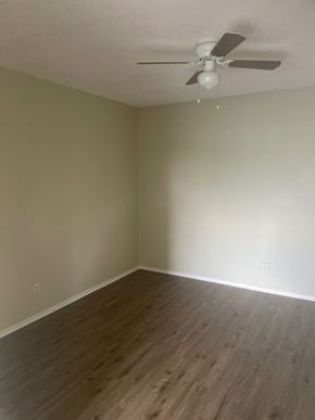 San Angelo house for rent - A room with a ceiling fan and wooden flooring.