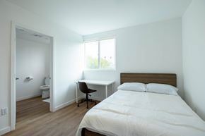 Los Angeles apartment for rent - A bedroom with a bed, desk, and chair.