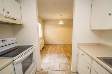 Boulder apartment for rent - A kitchen with a stove, oven, and sink.