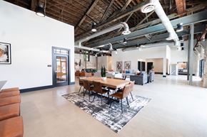 Columbus apartment for rent - A conference room with a long table surrounded by chairs.