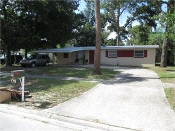 Orange Park house for rent - A house with a car parked in front.