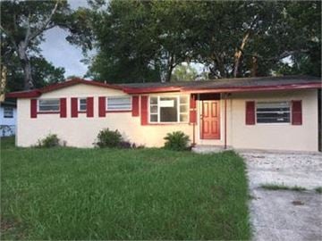 Orange Park house for rent - A house with red and white trim and a red door.
