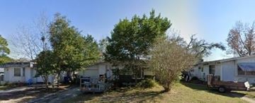 St Augustine house for rent - A sunny day at a mobile home park with a rainbow in the sky.