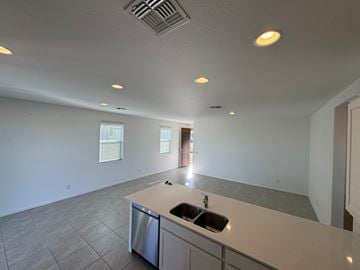 Tolleson house for rent - A kitchen with a sink and a dishwasher.