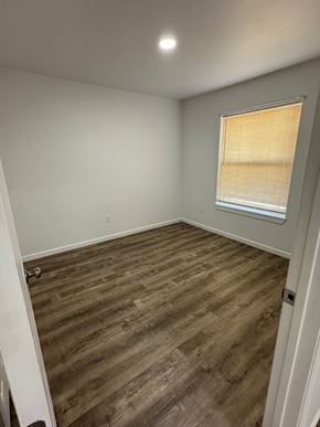 Granger apartment for rent - A room with a window and wooden flooring.