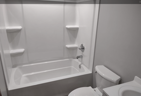 Lima house for rent - A white bathroom with a toilet, sink, and bathtub.