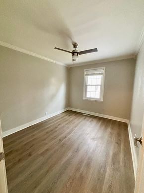 Piedmont house for rent - A room with a ceiling fan and a window.