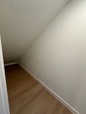 Benton City apartment for rent - A corner of a room with wooden flooring.