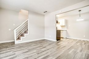 Arlington apartment for rent - A logo with the words Zen Living Management.