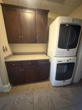Grinnell apartment for rent - A white oven and microwave are stacked on top of each other.