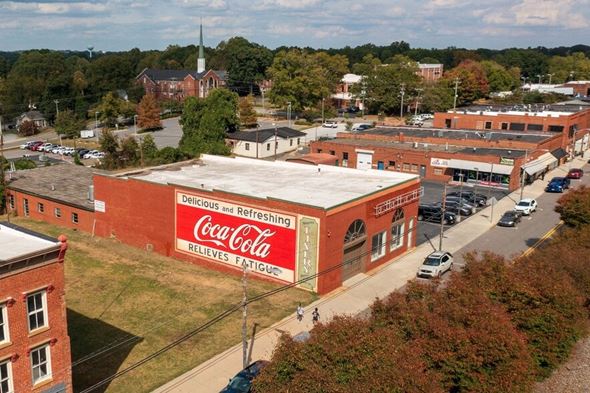 Mooresville apartment for rent - A Coca-Cola sign is on a building.