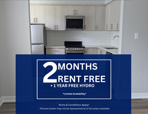 Toronto apartment for rent - A kitchen with a sign offering 2 months rent free and 1 year free hydro.