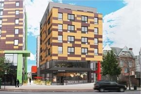 Philadelphia apartment for rent - A tall building with a red and yellow checkered pattern on the side.