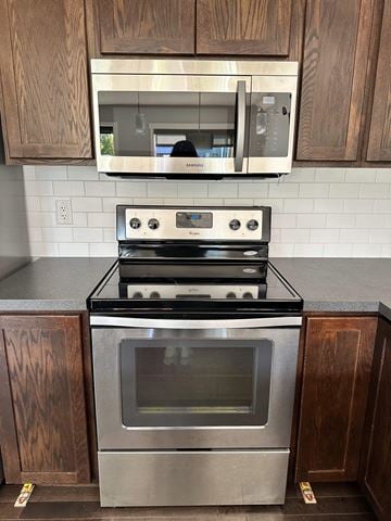 Edmonton apartment for rent - A stainless steel oven sits on a countertop in a kitchen.