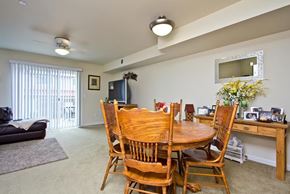 Longmont townhouse for rent - A dining room with a table and chairs.