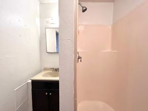 Sweeny house for rent - A bathroom with a sink and a shower.