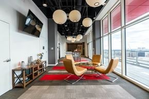 Philadelphia apartment for rent - A modern office space with a long table and chairs.