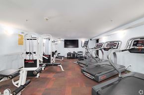Philadelphia apartment for rent - A gym with treadmills, weights, and exercise equipment.