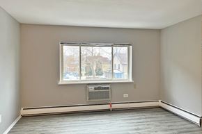 Forest Park apartment for rent - A room with a window and a heater on the floor.