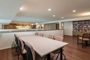 Longmont apartment for rent - A conference room with a long table and chairs.