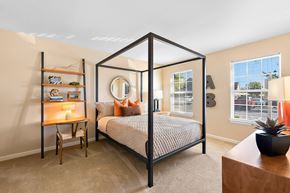 Murfreesboro apartment for rent - a bedroom with a canopy bed and a window