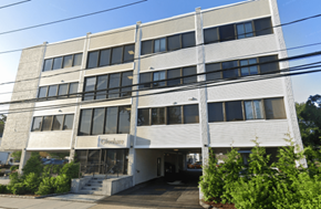 Stamford apartment for rent - A white building with the word "Cherrylite" on the front.
