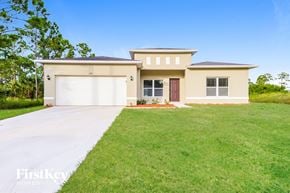 Palm Bay house for rent - A two-story house with a garage is for sale.