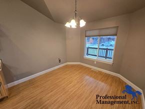 Billings house for rent - A room with wooden flooring and a window with blinds.