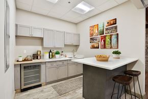 Shelton apartment for rent - A kitchen with a white counter and a fridge.