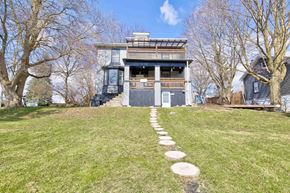 New Dundee apartment for rent - A house with a path leading to the front door.