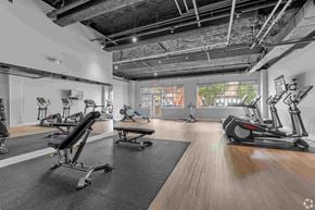 Shelton apartment for rent - A gym with a variety of exercise equipment including treadmills, stationary bikes, and rowing machines.