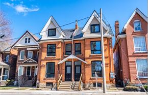 Hamilton apartment for rent - A row of houses with a blue sky in the background.