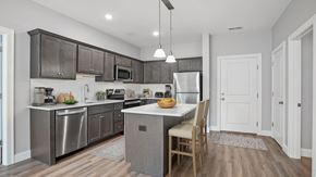 Shelton apartment for rent - A modern kitchen with a dining table and chairs.