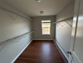 Durham house for rent - A room with a window and a wooden floor.
