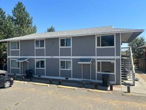 Benton City apartment for rent - A grey building with the number 1016 on it.