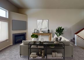 West Fargo townhouse for rent - A living room with a fireplace, a sofa, and a coffee table.