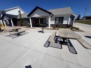 Grinnell apartment for rent - A building with a parking lot in front of it.