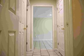 Conway apartment for rent - A hallway with a door at the end.