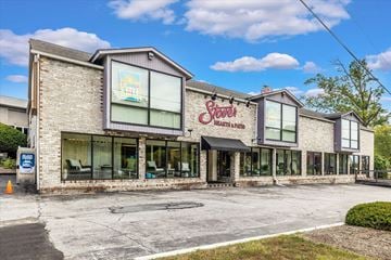 Frederick apartment for rent - A building with a sign that says "Steak's Heart & Hath" on it.