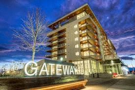 Calgary apartment for rent - The image shows a modern building with the name "GATEWAY" prominently displayed in front.
