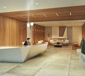 Toronto apartment for rent - A man in a suit is standing at the reception desk of a modern office.