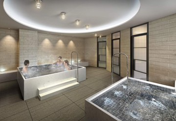 Toronto apartment for rent - A modern indoor swimming pool with people in it.