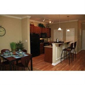 Midway Park apartment for rent - a kitchen and a dining room with a table and chairs
