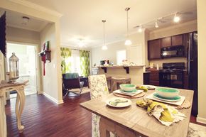 Greenville apartment for rent - a kitchen and dining room with a table and chairs