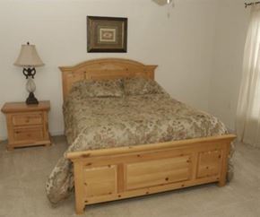 Greenville apartment for rent - a bedroom with a bed and two night stands