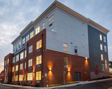Bound Brook apartment for rent - A modern building with a mix of brick and panel exterior.