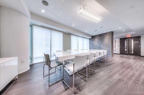 Toronto apartment for rent - A conference room with a long table and chairs.