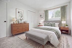 Royal Oak apartment for rent - A bedroom with a bed, nightstand, and dresser.